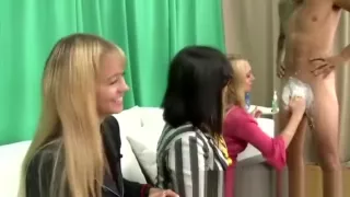 Classy clothed babes have a naked guys cock in reality groupsex