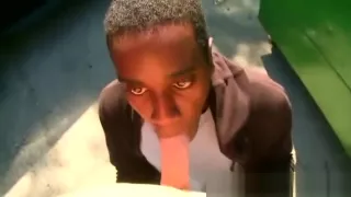 Black gang dude gives white guy head and ass