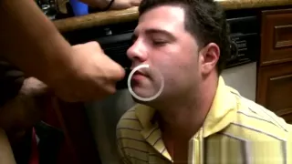 Boy is disgusted while receiving facial