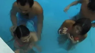 Hot girls Mai Sakurai and Rara Motofuji in bikini playing at the pool