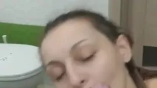 Amateur brunette wife swallows her husbands cum in the bathroom