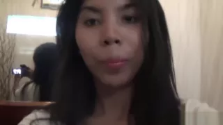 Sexy brunette Asian babe fools around with the camera