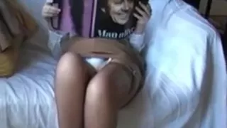 Sara Relaxing with a magazine