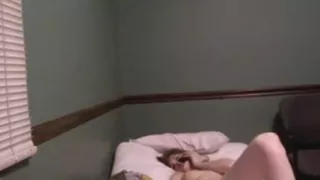 Girl in her bedroom with her boyfriend on the phone 1