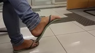 Amateur flip-flop dangling on bank