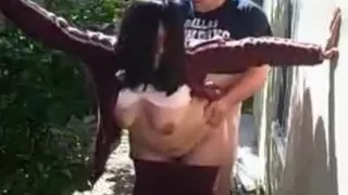 Couple fucking in the back of a party