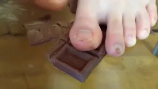 Asian wife jokes with her husband and tells him to lick his feet