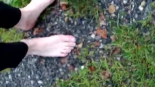 In long Zivalco Rubberboots and barefoot on Street and River