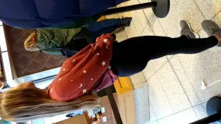 Candid teen in leggings ice cream shopping