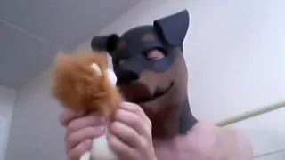 Rubber doggy masked girl is quite kinky