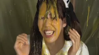 a girl covered with eggs