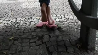 Candid girl feet and soft soles in public square