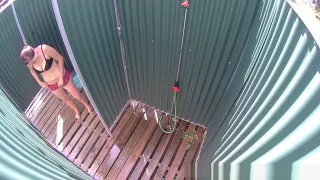 Brunette MILF Showering in Public Pool