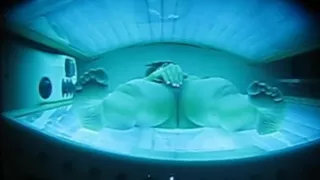 Peephole Captures Wife Masturbating In Tanning Bed