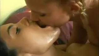 Brazilian girls sloppy kiss