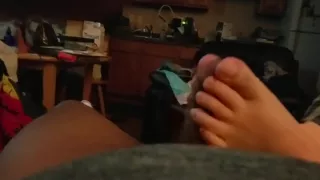 Footjob (covered cumshot)