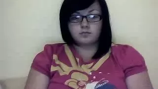 Chubby teen fingers her hairy pussy