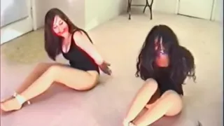 Two Women Tied in Leotards
