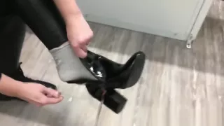 In changing room ... Should I buy these shiny boots?