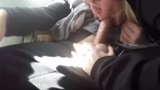 Crowded commercial airplane blowjob