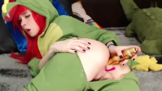 Cute redhead girl in costume playing with her ass