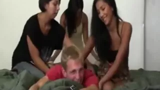 Three Girls Tickling a Guy