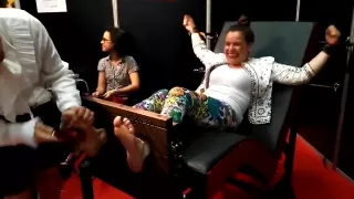 Mainstream woman feet tickling in stocks