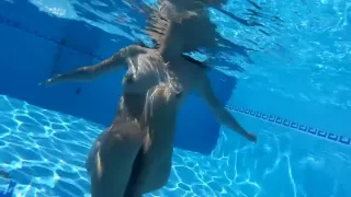 Hot sexy body in a cool Ibiza pool with a guy, relax music