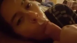 Slut wife plays with cum in her face