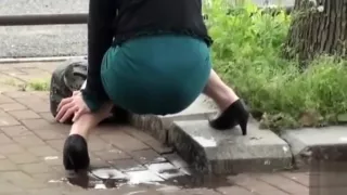 Beautiful Asian girl accidentally pisses in publi