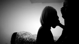 Gorgeous ebony silhouette slurping on beautiful black cock