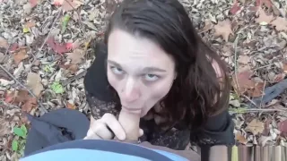 Couple role playing in the woods where she is a witch