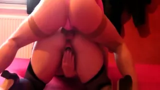 Two girls in stockings fucking each other