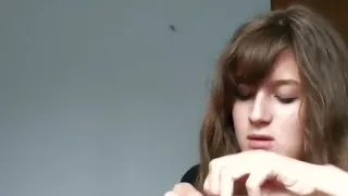 Cute girl blow up a lot of balloons