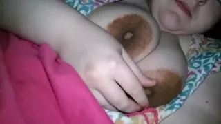 Plus size girl plays with her big tits