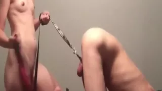 Dominant chick has got her man by the balls