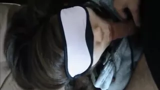 Hot girl with a blindfold sucking a hard cock slowly