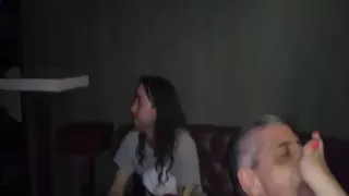 Kinky guy licking dirty feet at the local party