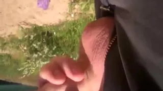 Horny guy jerks his cock in the middle of the street