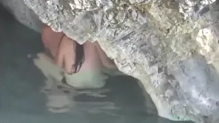Lovely couple having hardcore sex in the shallow water