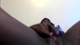 Black slut rubs her fat pussy to a nice orgasm