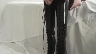 Boot wearing sex Goddess gives a stunning footjob