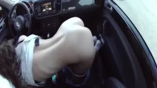 Lusty chick sucks my cock in the car