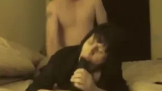 Nasty girl gets it doggie style while she sucks black dildo