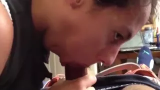 Nerdy girl gags giving a blowjob