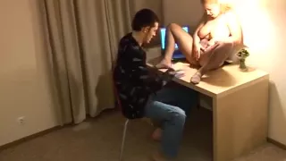 Mature wife gives younger boy head and footjob