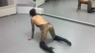 Girlfriend dressed in a leopard catsuit