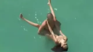 Couple fucking in sea