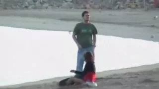 Crazy couple fucking on beach