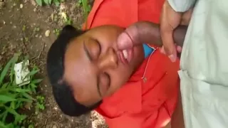 Black chick sucking her man and getting a facial in the park